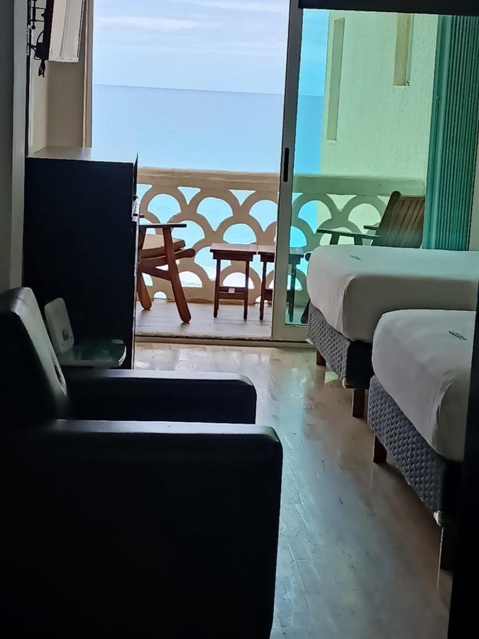 Capitan Suites Sea View Канкун Экстерьер фото